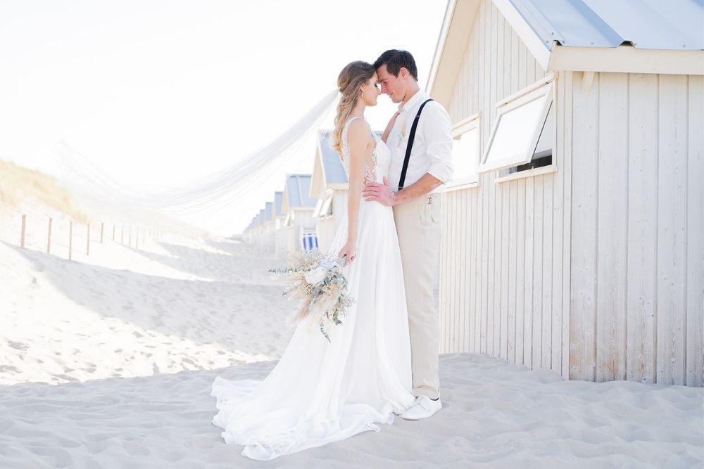a pastel blue beach wedding styled shoot